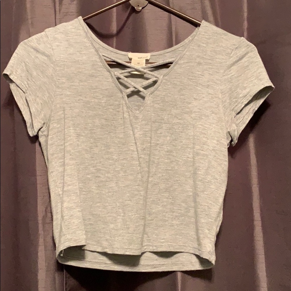 Short sleeved gray shirt with crisscross detailing